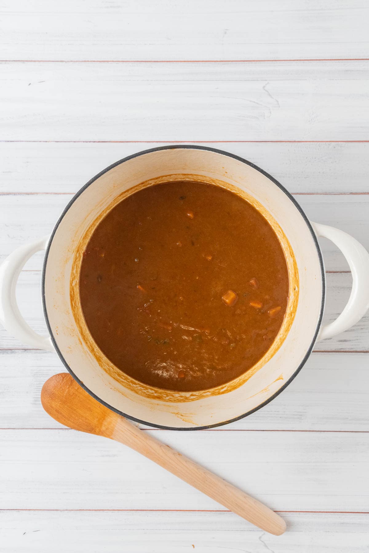 Partially pureed sweet potato black beans soup, ready to serve.